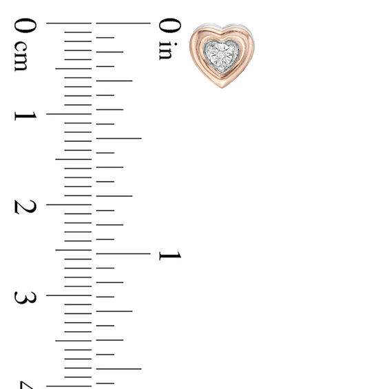 1/8 CT. T.W. Enhanced Black and White Diamond Reversible Heart Stud Earrings in Sterling Silver and 10K Rose Gold 1/8 CT. T.W. Enhanced Black and White Diamond Reversible Heart Stud Earrings in Sterling Silver and 10K Rose Gold