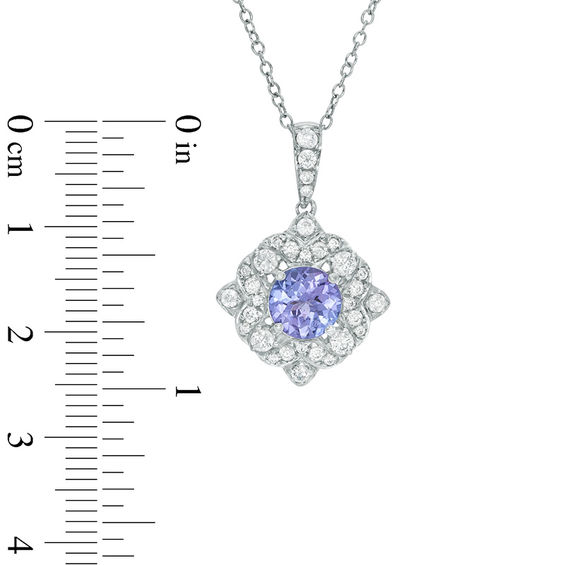 6.0mm Tanzanite and White Topaz Flower Frame Pendant in Sterling Silver