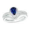 Thumbnail Image 0 of Pear-Shaped Lab-Created Blue Sapphire and 1/4 CT. T.W. Diamond Frame Chevron Bridal Set in Sterling Silver