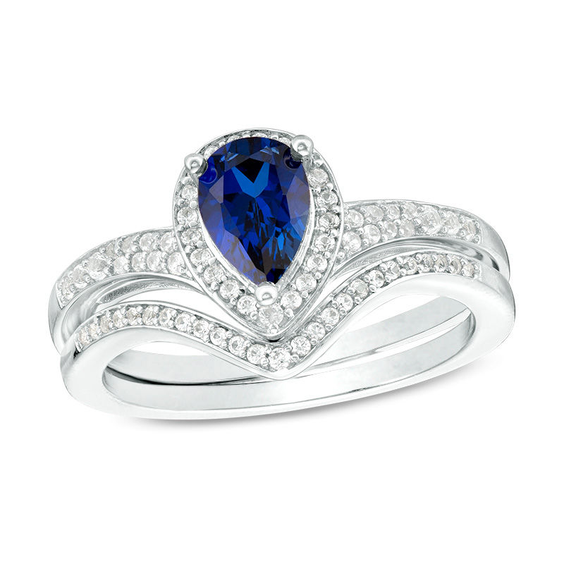 Pear-Shaped Lab-Created Blue Sapphire and 1/4 CT. T.W. Diamond Frame Chevron Bridal Set in Sterling Silver