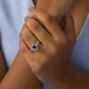 Pear-Shaped Lab-Created Blue Sapphire and 1/4 CT. T.W. Diamond Frame Chevron Bridal Set in Sterling Silver