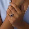 Thumbnail Image 1 of Pear-Shaped Lab-Created Blue Sapphire and 1/4 CT. T.W. Diamond Frame Chevron Bridal Set in Sterling Silver