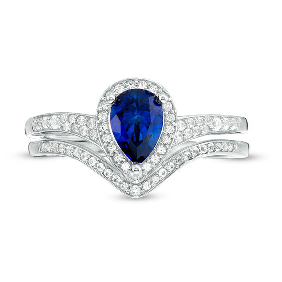 Pear-Shaped Lab-Created Blue Sapphire and 1/4 CT. T.w. Diamond Frame Chevron Bridal Set in Sterling Silver