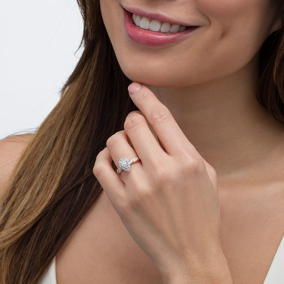 7/8 CT. T.w. Pear-Shaped Diamond Frame Twist Shank Engagement Ring in 10K Rose Gold