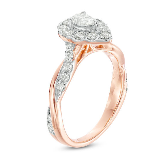 7/8 CT. T.w. Pear-Shaped Diamond Frame Twist Shank Engagement Ring in 10K Rose Gold