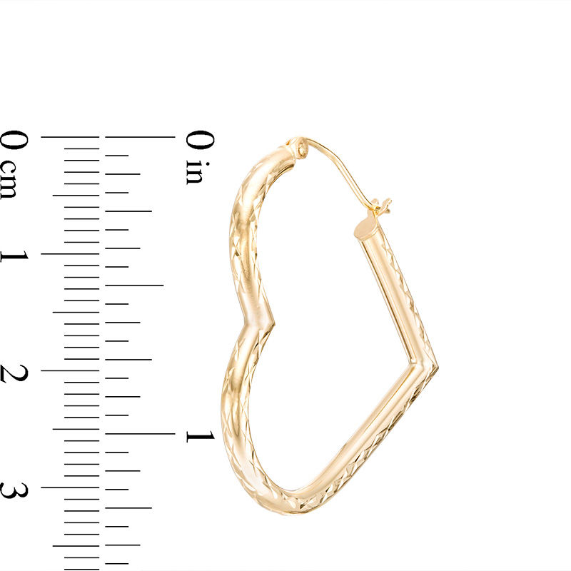Main Image 2 of Diamond-Cut Faceted Heart-Shaped Hoop Earrings in 10K Gold