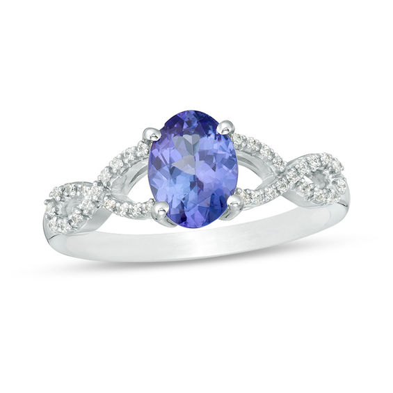 Oval Tanzanite and 1/15 CT. T.w. Diamond Twist Shank Ring in 10K White Gold