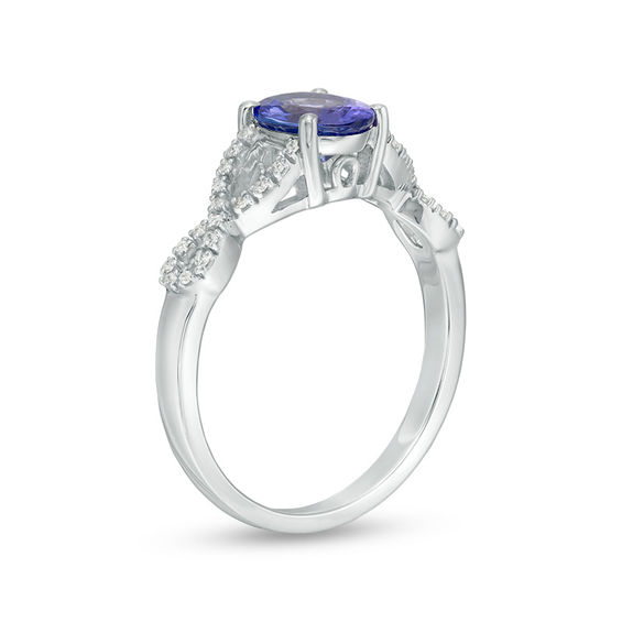 Oval Tanzanite and 1/15 CT. T.w. Diamond Twist Shank Ring in 10K White Gold