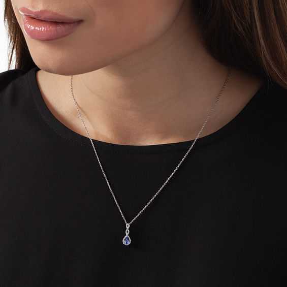 Pear-Shaped Tanzanite and 1/10 CT. T.w. Diamond Infinity Twist Pendant in 10K White Gold