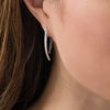 Thumbnail Image 1 of 1/2 CT. T.W. Enhanced Black and White Diamond Tapered Curve Front/Back Earrings in Sterling Silver