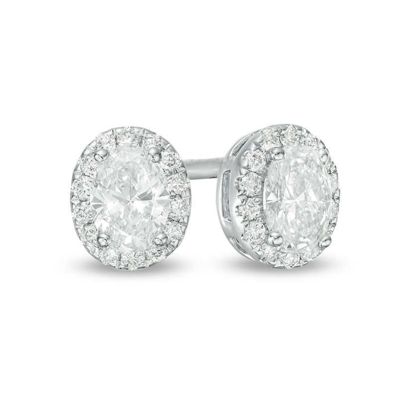 Main Image 1 of 1/2 CT. T.W. Certified Oval Diamond Frame Stud Earrings in 14K White Gold (I/SI2)