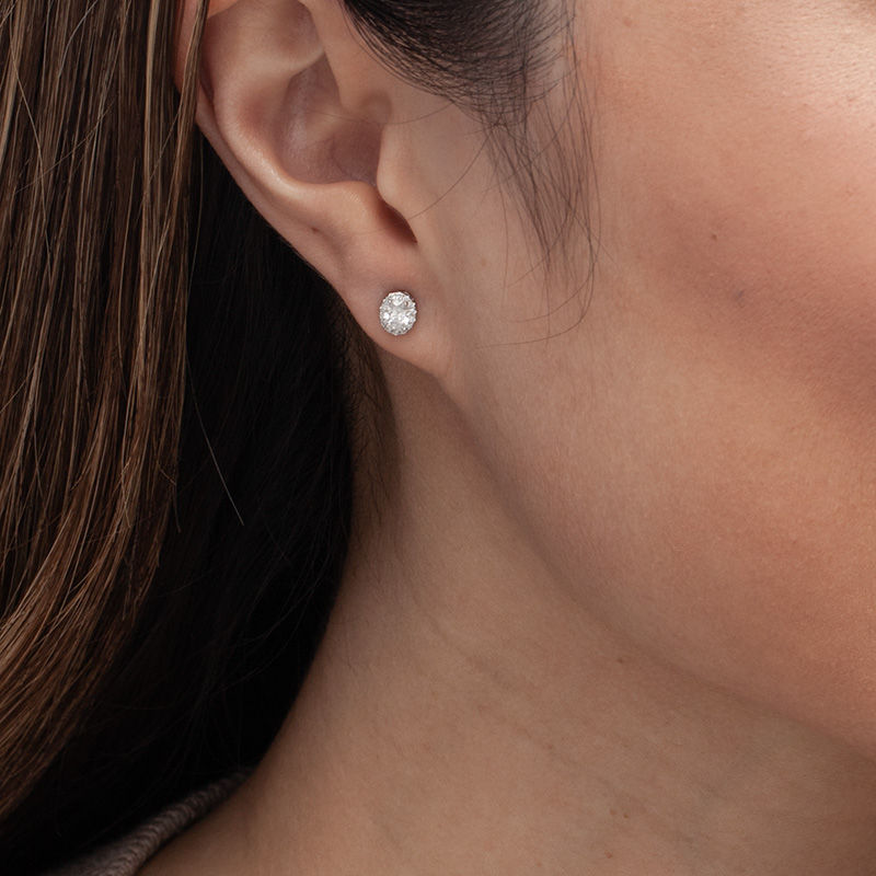 Main Image 2 of 1/2 CT. T.W. Certified Oval Diamond Frame Stud Earrings in 14K White Gold (I/SI2)
