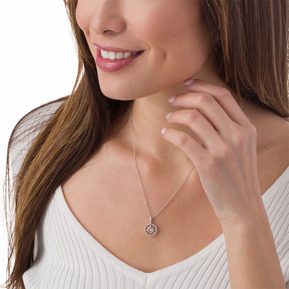 0.065 CT. T.w. Diamond Compass Pendant in Sterling Silver