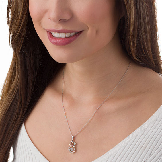 Unstoppable Love™ 1/20 CT. T.W. Diamond Sitting Cat with Bow Pendant in Sterling Silver and 10K Rose Gold Unstoppable Love™ 1/20 CT. T.W. Diamond Sitting Cat with Bow Pendant in Sterling Silver and 10K Rose Gold