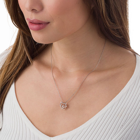 0.09 CT. T.w. Diamond Devil Heart Outline in Sterling Silver and 10K Rose Gold