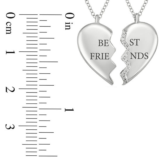 1/20 CT. T.w. Diamond "Best Friends" Broken Heart Pendant Set in Sterling Silver