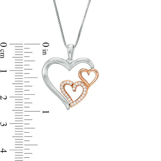 1/8 CT. T.w. Diamond Triple Heart Pendant in Sterling Silver and 10K Rose Gold