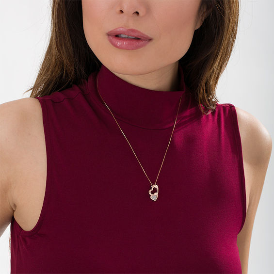 1/15 CT. T.w. Composite Diamond Tilted Double Heart Pendant in Sterling Silver with 10K Rose Gold