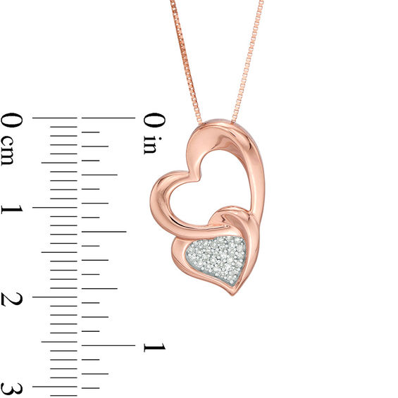 1/15 CT. T.w. Composite Diamond Tilted Double Heart Pendant in Sterling Silver with 10K Rose Gold