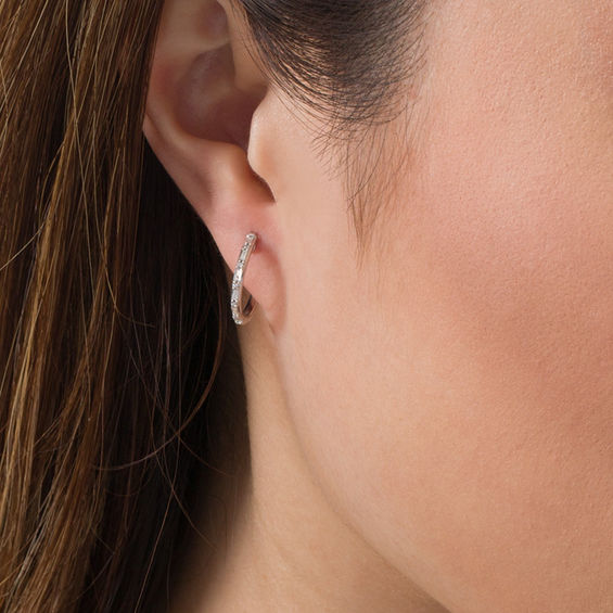 1/6 CT. T.w. Baguette and Round Diamond Hoop Earrings in 10K White Gold