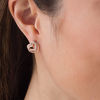 Thumbnail Image 2 of Diamond Accent Interlocking Hearts Stud Earrings in Sterling Silver with 14K Rose Gold Plate