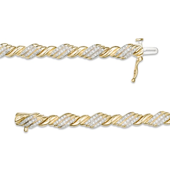 1 CT. T.w. Diamond Rolling Flame Link Bracelet in 10K Gold - 7.25"