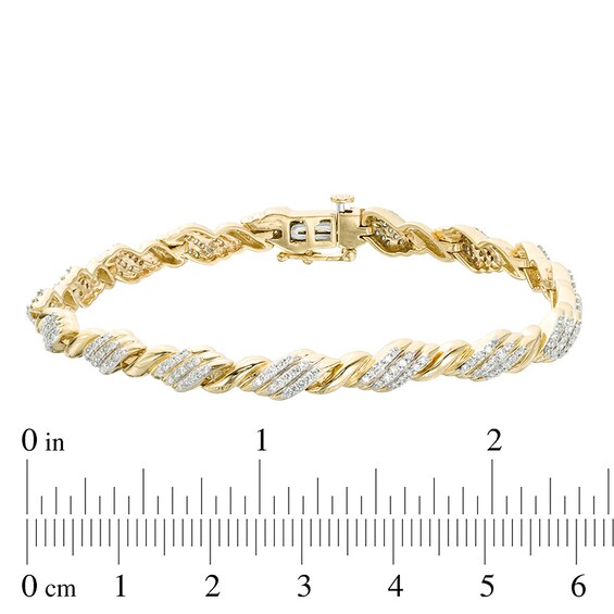 1 CT. T.w. Diamond Rolling Flame Link Bracelet in 10K Gold - 7.25"