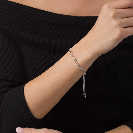 1/20 CT. T.w. Diamond "I Heart U" and Infinity Bolo Bracelet in Sterling Silver and 10K Rose Gold - 9.5"