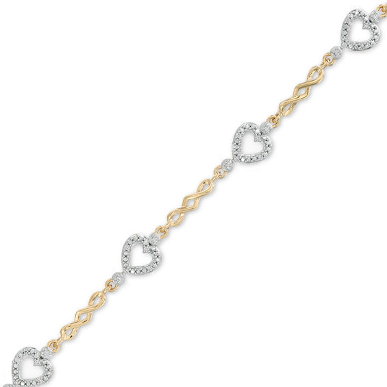 1/10 CT. T.w. Diamond sideways Heart Station Twist Bracelet in 10K Gold - 7.5"