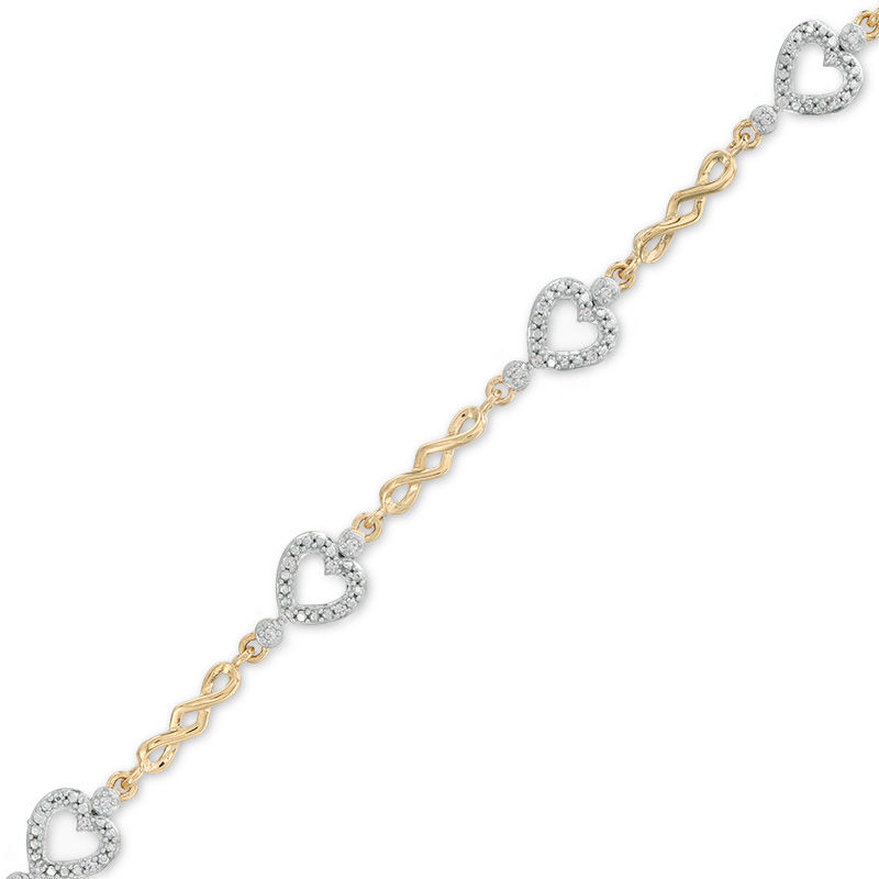 Main Image 1 of 1/10 CT. T.W. Diamond sideways Heart Station Twist Bracelet in 10K Gold - 7.5"