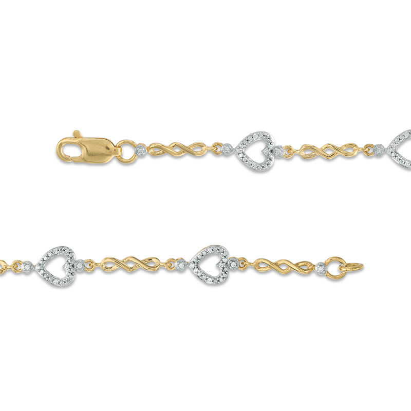 Main Image 3 of 1/10 CT. T.W. Diamond sideways Heart Station Twist Bracelet in 10K Gold - 7.5"