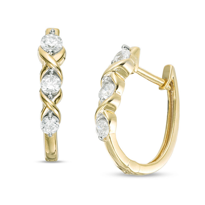 Main Image 1 of 1/2 CT. T.W. Diamond Three Stone "XO" Twist Hoop Earrings in 10K Gold