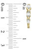 Thumbnail Image 2 of 1/2 CT. T.W. Diamond Three Stone "XO" Twist Hoop Earrings in 10K Gold