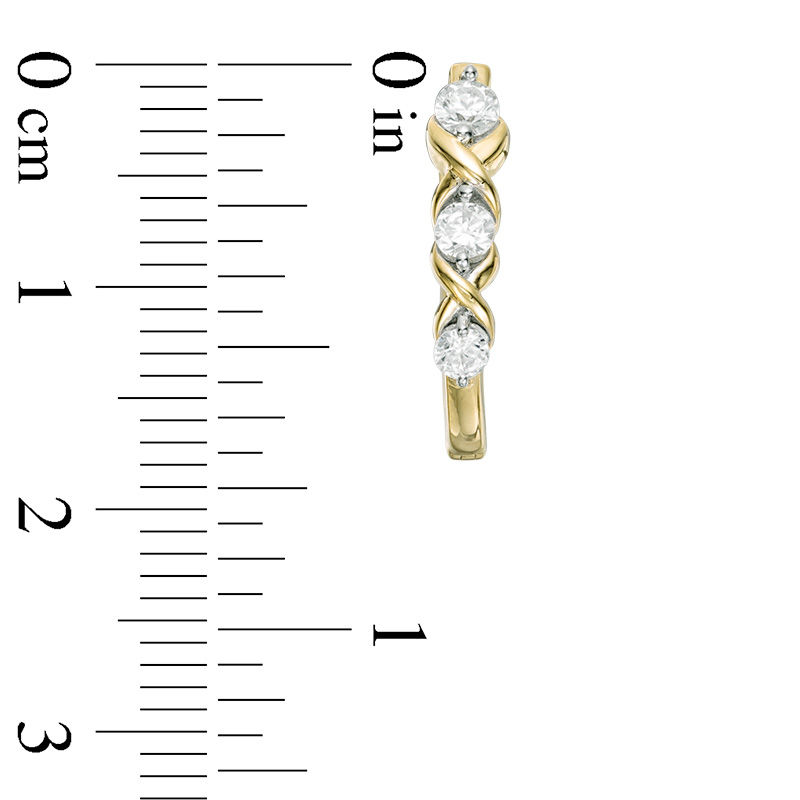 1/2 CT. T.W. Diamond Three Stone "XO" Twist Hoop Earrings in 10K Gold