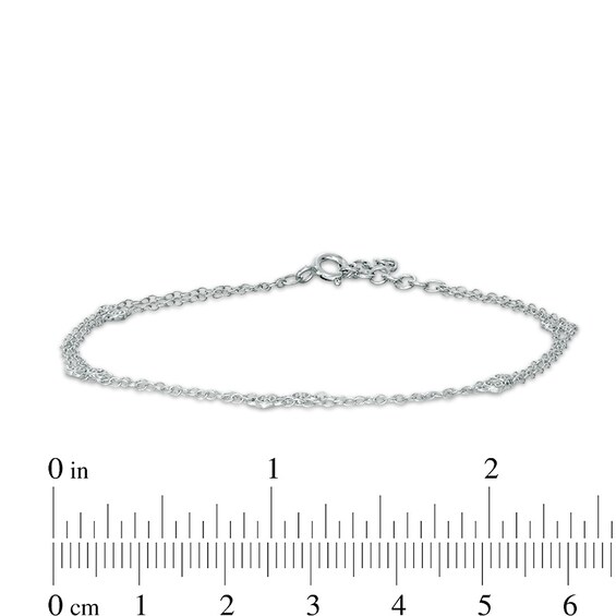1/20 CT. T.w. Diamond Bezel-Set Station Double Strand Bracelet in 10K White Gold
