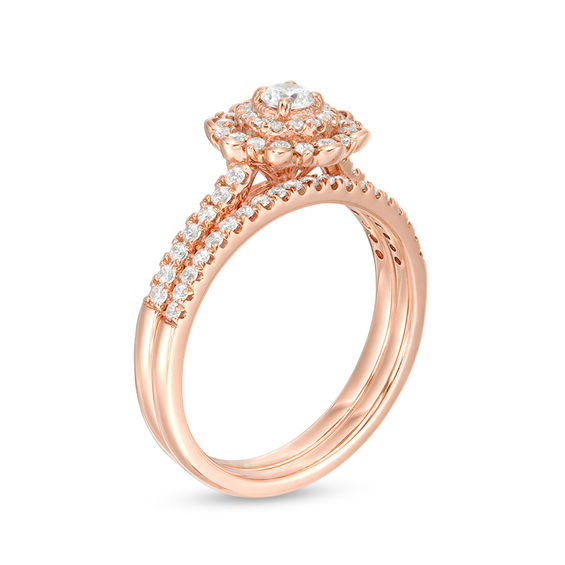 1/2 CT. T.w. Diamond Flower Frame Bridal Set in 14K Rose Gold