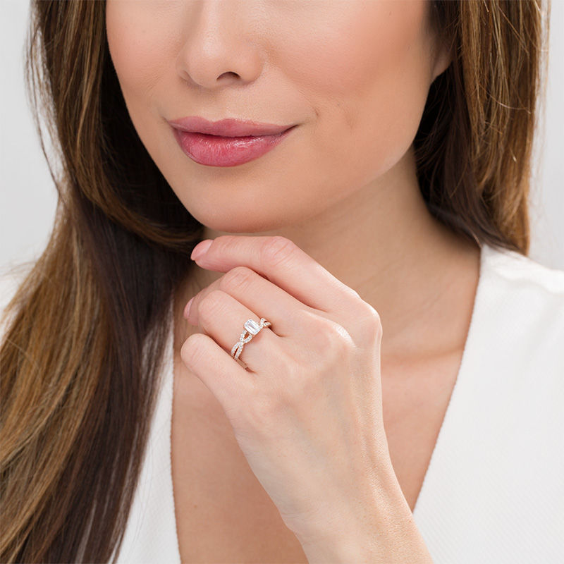 Main Image 2 of 1-1/4 CT. T.W. Certified Emerald-Cut Diamond Twist Engagement Ring in 14K Rose Gold (I/SI2)