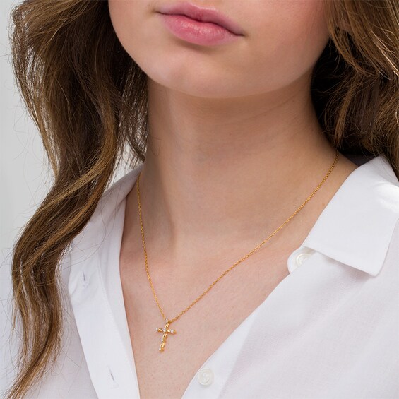 1/10 CT. T.w. Diamond and Rice Bead Cross Pendant in 10K Gold