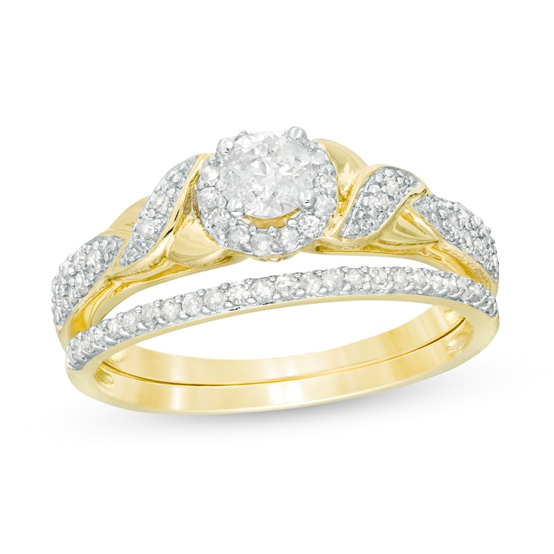 1/2 CT. T.W. Diamond Frame Twist Shank Bridal Set in 10K Gold