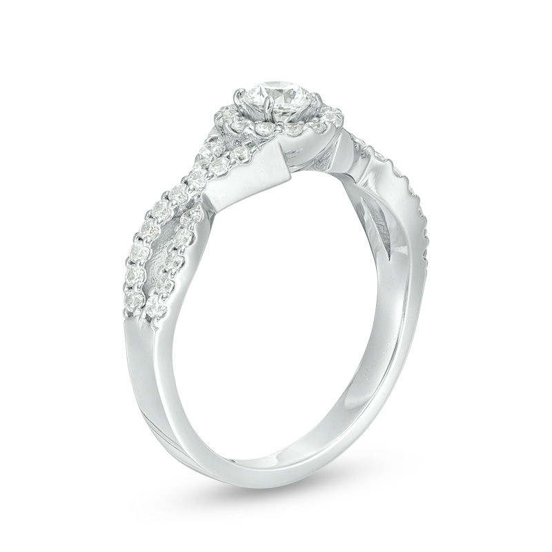 1/2 CT. T.W. Diamond Frame Twist Engagement Ring in Platinum (I/SI2)