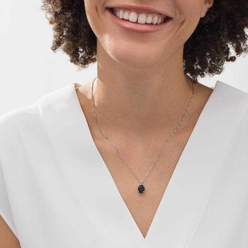 Main Image 2 of Oval Onyx and Diamond Accent Pendant in Sterling Silver