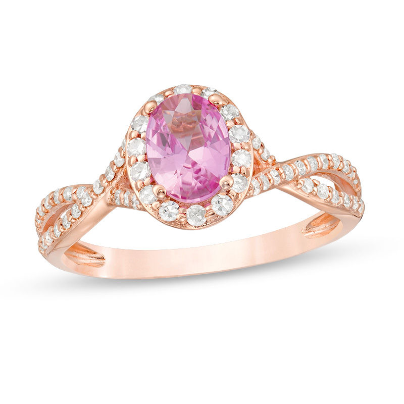 Main Image 1 of Oval Pink Sapphire and 1/3 CT. T.W. Diamond Frame Crossover Shank Ring in 14K Rose Gold