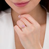 Thumbnail Image 2 of Oval Pink Sapphire and 1/3 CT. T.W. Diamond Frame Crossover Shank Ring in 14K Rose Gold