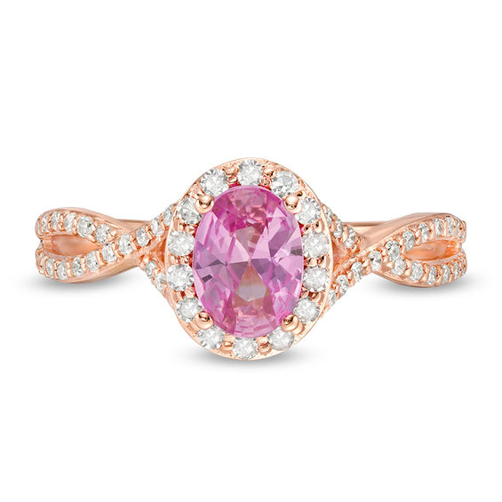 Oval Pink Sapphire and 1/3 CT. T.w. Diamond Frame Crossover Shank Ring in 14K Rose Gold