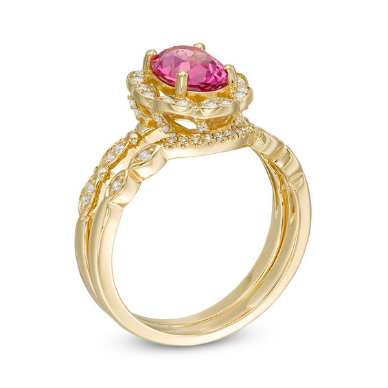 Oval Pink Tourmaline and 1/4 CT. T.w. Diamond Petal Frame Floral Bridal Set in 14K Gold