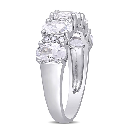 Oval Lab-Created White Sapphire and 1/10 CT. T.w. Diamond Five Stone Ring in 10K White Gold