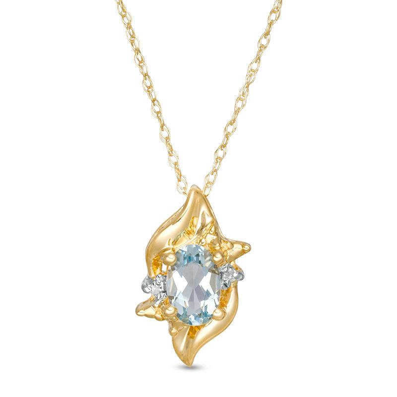 Oval Aquamarine and Diamond Accent Flame Burst Pendant in 10K Gold