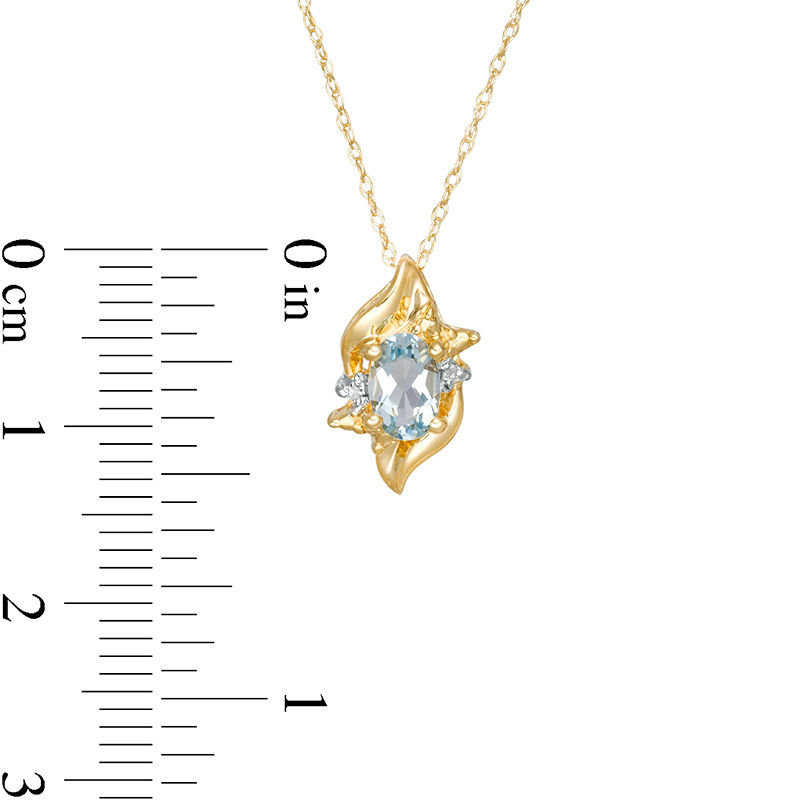 Oval Aquamarine and Diamond Accent Flame Burst Pendant in 10K Gold