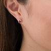 Thumbnail Image 1 of Oval Lab-Created Ruby and Diamond Accent Flame Burst Stud Earrings in 10K Gold