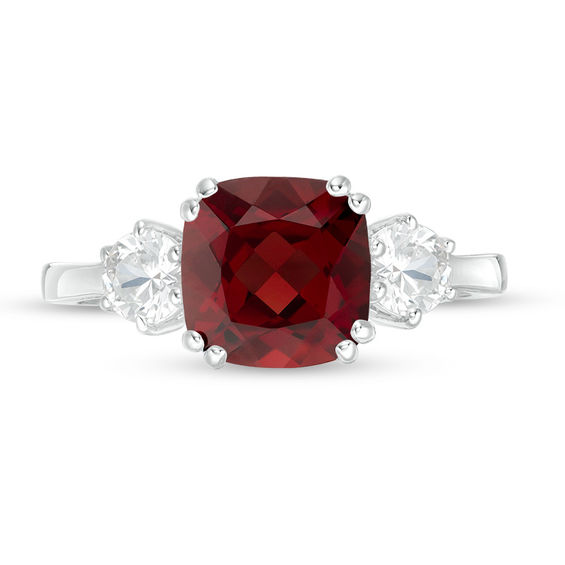 8.0mm Cushion-Cut Garnet and 4.0mm Lab-Created White Sapphire Three Stone Ring in Sterling Silver